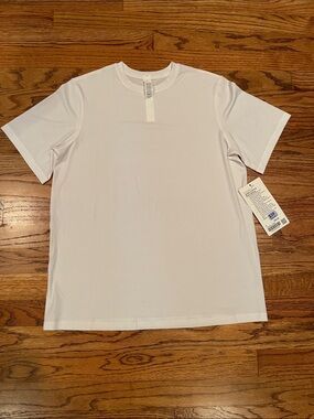 NWT LULULEMON JERSEY TRAINING SHORT SLEEVE WHITE TEE SHIRT SIZE 4
